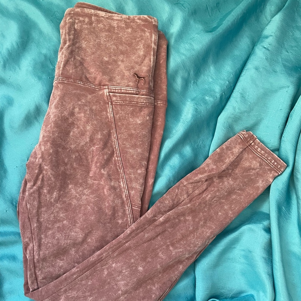 Pink leggings that are a pink purple color